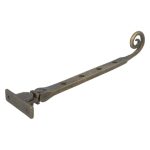 Raamuitzetter met krul, brons antiek.