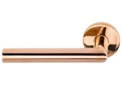 Enkele deurklink links BASICS LBII-19 op ronde rozet PVD gepolijst Koper