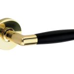 Deurklink op geveerd rozet Ton ebben/Vivo messing ongelakt