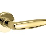 Deurklink op geveerd rozet Dudok/Vivo messing ongelakt