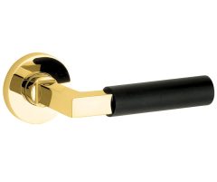 Deurklink op geveerd rozet Bauhaus ebben/Vivo messing ongelakt