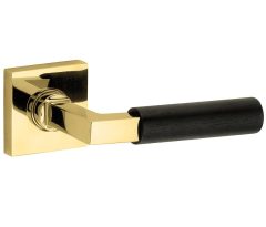 Deurklink op geveerd rozet verdekt Bauhaus ebben messing ongelakt