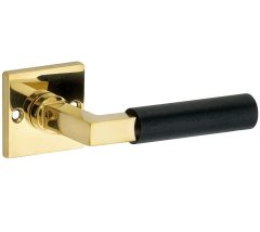 Deurklink op ongeveerd rozet Bauhaus ebben messing ongelakt