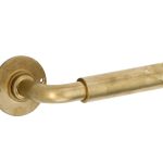 Deurklink op ongeveerd rozet Frankfurt/Chemin de Fer messing antiek