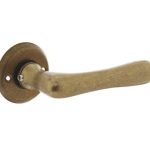 Intersteel enkele deurklink Trento met rozet ø50x5mm messing getrommeld