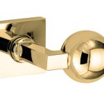 Knopkruk op geveerd rozet verdekt Bauhaus messing ongelakt