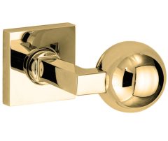 Knopkruk op geveerd rozet verdekt Bauhaus messing ongelakt