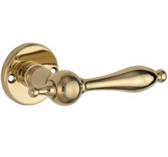 Deurklink op ongeveerd rozet Barock/facet messing ongelakt