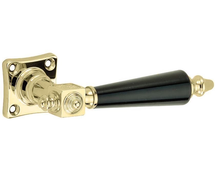 Deurklink op geveerd vierkant rozet Roman bakeliet messing gelakt