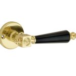 Deurklink op ongeveerd rozet Roman bakeliet/facet messing gelakt