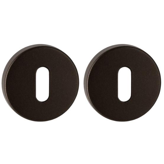 Set van twee sleutelplaatjes WCX brons