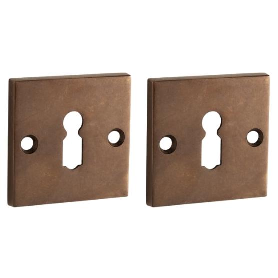 Set van twee Sleutelplaatjes Bauhaus messing antiek brons