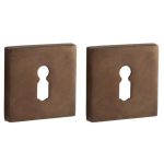 Set van twee Sleutelplaatjes Bauhaus verdekt messing antiek brons