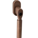 SKG2 Draaikiepgarnituur afsluitbaar Bauhaus/ovaal messing antiek brons