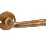 Deurklink op ongeveerd rozet Art-Deco/Elegant messing antiek