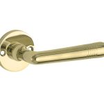 Deurklink op ongeveerd rozet Art-Deco/Elegant messing ongelakt